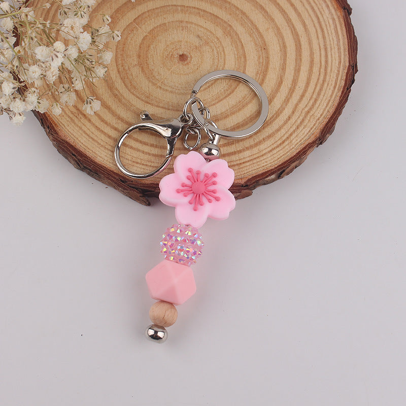 Wholesale Begonia Daisy Flower Beaded Tassel Keychain